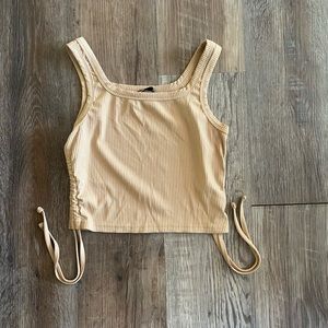Side cinching tan tank top